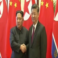 زعيم كوريا الشمالية يتعهد من بكين بنزع السلاح النووي