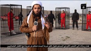 داعش: يعرض 21 أسيرًا كرديًا في أقفاص الحرق
