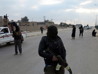 قوات عربية وقود حرب واشنطن على داعش.. وقرقاش: أبوظبي ستشارك في الحرب