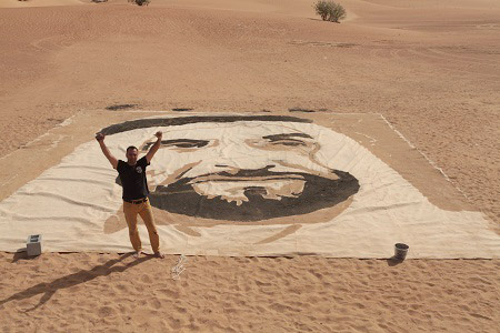 الانتهاء من رسم أكبر لوحة للشيخ زايد على الرمال