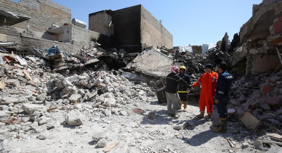 التحالف يعترف بقتل 105 مدنيين بقصف مبنى بالموصل