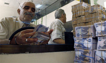 طهران وبغداد تتفقان على تأسيس بنك مشترك