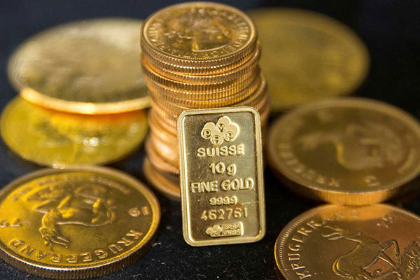الذهب يبدأ عام 2017 مرتفعاً بالرغم من قوة الدولار